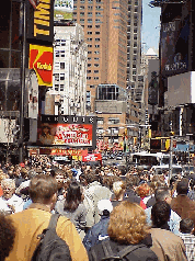 Top left picture you see New York tourists and residents on the sidewalk. Electrifying Broadway!  It's the most exciting place in New York.  It doesn't matter what hour you come to Times Square you'll see traffic and people on the move.