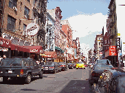 When you visit New York's Little Italy come with a big appetite! The main feature of this small but colorful area of NYC is the great Italian food. Top left picture you see a long shot of Mulberry Street in Little Italy. 