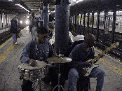 Top left photo you see subway performers in the 72nd Street subway station as the number 1 train comes in on the tracks in the distance.