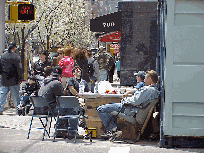 Center right photo you see construction workers taking their lunch break on Madison Avenue. They brought along chairs and made a picnic while shoppers rushed along to the pricey designer stores nearby. These cool workers seemed to be having the most fun.