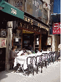 Bottom right picture you see Nosidam Caf on Madison Avenue on the East Side of town.  Sidewalk cafes are romantic and great places for people watching.