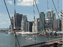 Top left picture was taken on a walk across the Brooklyn Bridge.  You see the World Trade Towers in the distance to the left. Top right picture was also taken from the Brooklyn Bridge.  Here you see the tip of downtown NYC.