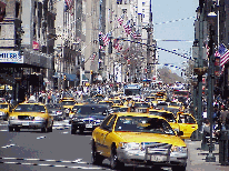 Center right picture you see heavy traffic on Fifth Avenue.  Getting a cab during rush hour can take time and courage.  When it rains it takes a miracle.