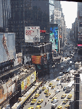 Top left picture is an aerial view of Broadway and Times Square.  In the front center of the picture you see the TDF stand where you can purchase day of the show tickets at discount prices.