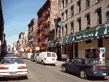 Bottom right picture was also taken on Orchard Street.  You'll find clothing, fabric, handbags, etc. for sale here.