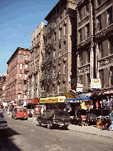 The Lower East Side is known as a shopping area for very deep discounts on clothing, shoes, leather goods, fabric, etc.  It's also known for Delancey Street and the pickle stores.