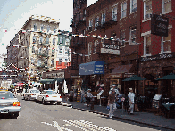 Bottom right picture you see Mulberry Street in Little Italy.  The two areas are so close you'll see a Chinese  store next to a pasta restaurant.