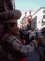 Top right you see the statue of a chef outside a restaurant on Mulberry Street.  You'll find menus posted in the windows and statues holding lunch specials.  They are specials too!  The lunch prices are very inexpensive compared to most restaurants in NY