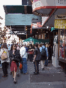 Center right photo you see people walking the sidewalks of Mulberry in front of Ferrara. This is a wonderful place to stop for an Italian pastry. If you go home hungry it would be a shame!