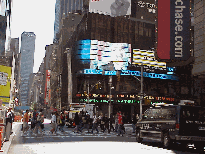 Bottom right picture you see ABC studios in Times Square.  Go early in the morning and watch TV live.