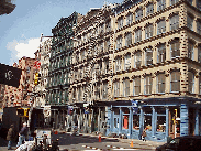 Center right picture you see a few of the wonderful cast-iron buildings in Soho.