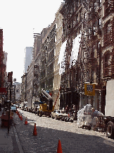 Top right photo you see a cobblestone street in Soho.