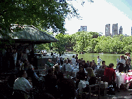 Top right picture you see people at the Boat House Caf enjoying a nice lunch.  In the background you see the skyline of the Upper West Side of Manhattan.