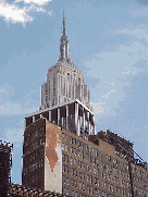 Top left picture you see the top of the Empire State Building competing for attention with a Gap Advertisement.