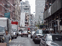 Top right picture you see how narrow the streets are in Little Italy.  We strongly suggest you leave the car at home and take a cab.  Parking is really tight and you might miss a meal trying to find a space.