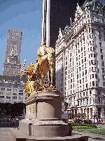 New York City has lots of famous buildings.  You won't find buildings   anywhere in the world more spectacular than the ones you'll see on 5th Avenue and 6th Avenue in Midtown. Top left picture you see the gold statue in Grand Army Plaza.