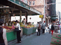 Top right picture you see a store selling fruits and vegetables on Grand Street in Chinatown.