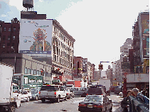 Bottom right picture you see a long shot of Canal Street.  With only a few dollars you can have a great time shopping here for knock off T-shirts, handbags and many other items.