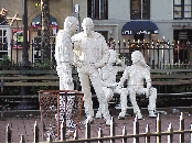 Center right picture you see the gay statues in Sheridan Square Park.  This is close to Christopher Street which is a popular street catering to the gay community.