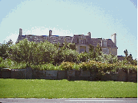 Top left you see a couple more mansions on the beach in the Hamptons.  You'll notice too that the homes aren't close together. Center right picture is another beach home or mansion in the Hamptons.  The wealthy hide their mansions behind hedges.