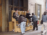 Top right photo you see New Yorkers getting their morning shoe shine near Grand Central Station.