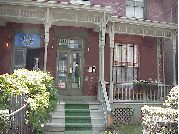 Top right you see a beautiful  home on West 130th Street.  This porch looks so inviting you would think you are in the deep south!