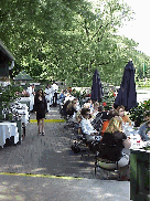 Center right picture you see people enjoying lunch at the Boat House Restaurant.