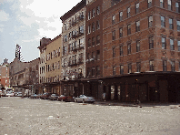 Top right picture you see some of the old buildings in the meat packing district.  You'll still see a few butchers here and there taking their breaks.  Next door to the butcher stores you'll see expensive art galleries.