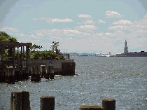 Center right picture you see one of the pretty views along the esplanade at Battery Park.  That is the Statue of Liberty you see distant right.