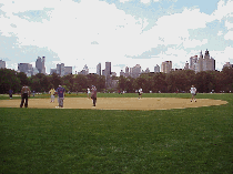 Center right picture you see the Great Lawn in Central Park where there's a ballgame going on today.  In the background you see the skyline of the southern end of Central Park, New York City.