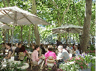 Bottom right picture you see people dining at the restaurant at Bryant Park.