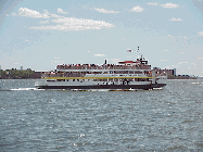 Top left photo you see a Circle Line cruise ship making it's way around the southern tip of NYC.