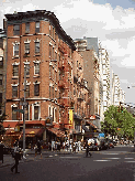 Top right photo you see Bleecker Street and the white buildings in the distance are part of the dormitory for New York University.