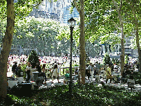 Center right picture you see Bryant Park in the middle of lunch hour.  As you can see, Bryant Park isn't exactly an undiscovered treasure!  Bryant Park is located in the heart of midtown which makes it very popular for business people.