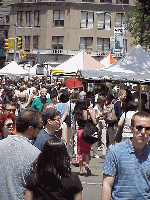 Top right picture you see shoppers in Union Square.  This isn't the wholesale district but a farmers market where New Yorkers can purchase fresh flowers, vegetables, breads, jams, and cheeses, etc.