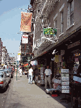 Center right picture you see gifts shops on Mulberry.  You can buy souvenirs such as aprons, magnets, and chef hats (Italian, of course!)