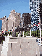 Bottom right picture you see a statue of a gun on the lawn at the United Nations.  In the background you see Tudor City.