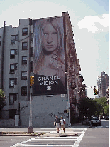 Top right picture you see a billboard on Houston Street. If you continue walking south of here you will be in Soho, north of here and you are in the village.