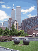 Center right photo you see the artwork on the lawn downtown at Battery Park.  In the distance you see the World Trade Center.