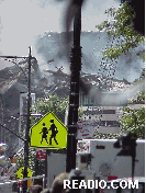 Center right picture you see ground zero of the war zone.  When you look at the school crossing sign you can't help but imagine the effects of this tragedy on our nation's children.