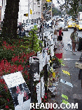 Top right picture you see a sidewalk to the subway where the fence has been covered with photos of victims of the terrorist attack.  You overhear people telling where they were when it happened, what they saw or you see them read and wipe their eyes.