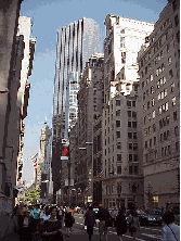 Top right picture you see a long shot of Fifth Avenue.  In the far distance you see Trump Tower.  This is a Donald Trump's luxury shopping 