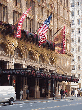 Practice, practice, practice. or just buy a ticket. Do visit Carnegie Hall. Bottom right picture you see Carnegie Hall on the corner of Seventh Avenue at 57th Street.