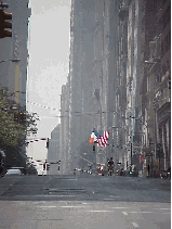 It hasn't been easy for the residents and businesses of downtown New York City.   Some of the residents still haven't been able to go home.  Top right you see the American flags on Broadway as the smoke filled the air.