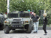 Top right you see an Army vehicle in front of City Hall. This seemed like such an unusual sight at first but now most people are getting use to it and liking it!