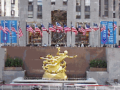 Top right you see the gold statue in the center of Rockefeller Center. Of course if you watch the NBC Today Show you see this every morning.  You'll notice the American flags in the background.  Like most areas of the country, NYC is covered in flags.