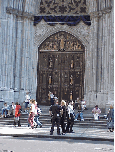 Center right picture you see one of the doors to St. Patrick's Cathedral.  You'll notice the purple and black drape above the door.  Unfortunately there have been many funerals held here and throughout the city in recent weeks.