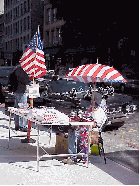 What's popular in NYC?  American flags.  Top right photo you see a lady selling American flags on West Broadway.