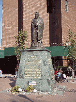 Top right picture is Confucius Plaza.  The bronze statue is of the Chinese philosopher, 551-479 BC.  At the bottom of the inscription you'll see an American flag.  The Chinese of Chinatown proudly display the American flag.