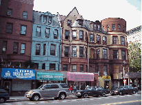 Center right photo you see a row of homes in the Sugar Hill section of Harlem.